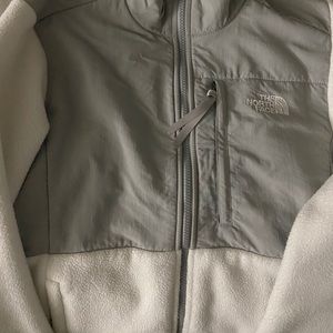 White and gray North Face jacket